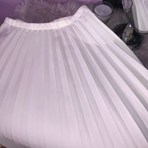 White pleated skirt